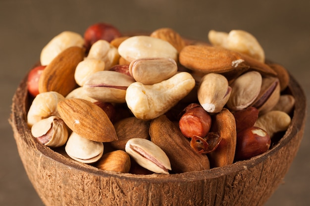 Mix of nuts on a wooden table