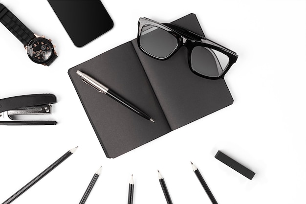 Mix of office supplies and business gadgets on a modern desk