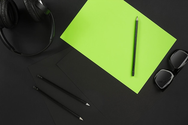 Mix of office supplies on a modern desk