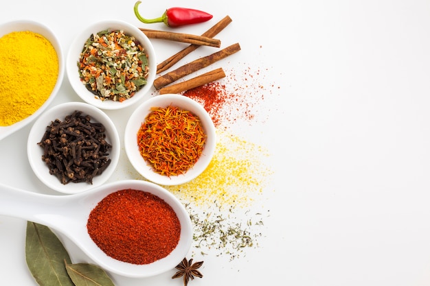 Photo mix of powder spices on table with copy-space