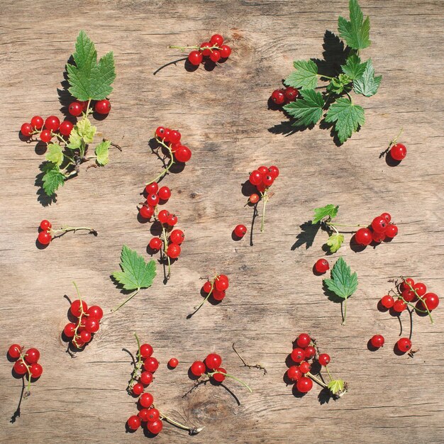 Mix of ripe berries on wooden background