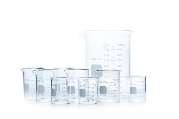 Mix size of measuring beakers for science experiment in laboratory isolated on white