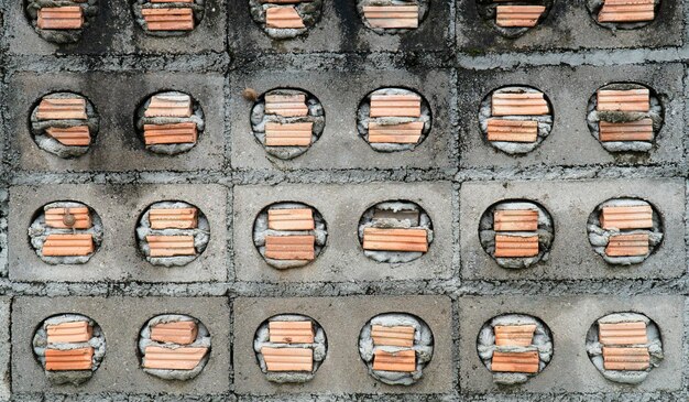 Mixed brick wall with plaster.