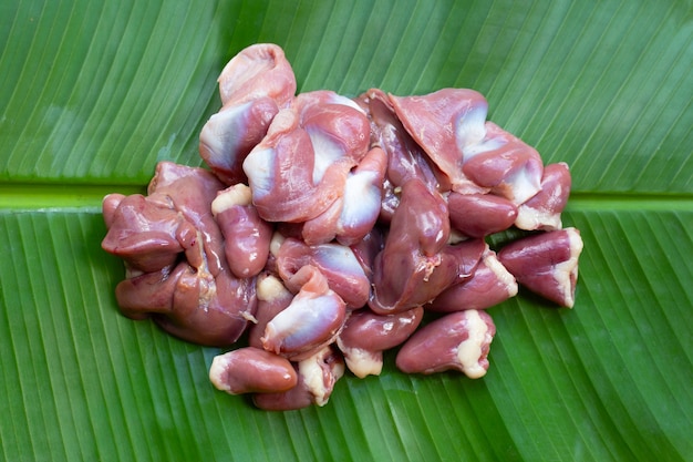 Mixed chicken entrails on banana leaf