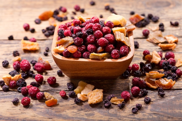 Mixed of dried fruits  on a wooden table