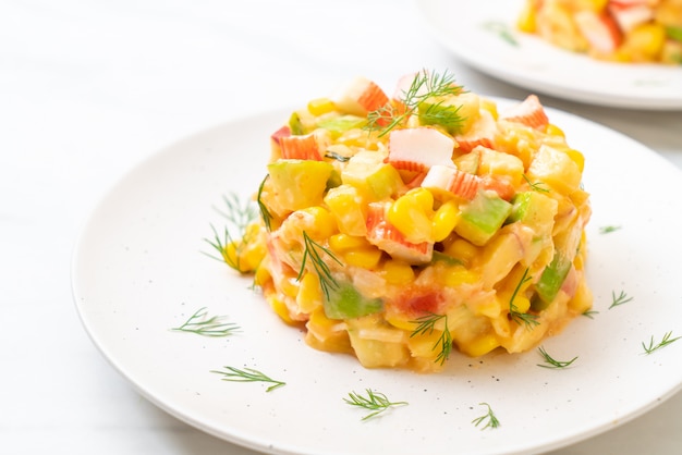 mixed fruit salad with crab stick (apple, corn, papaya, pineapple)