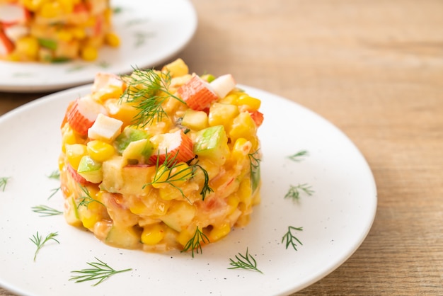 mixed fruit salad with crab stick (apple, corn, papaya, pineapple)