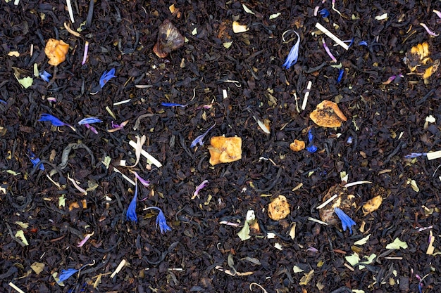 Фото mixed fruit tea травяной чай, приготовленный из сухофруктов и сухих цветов.