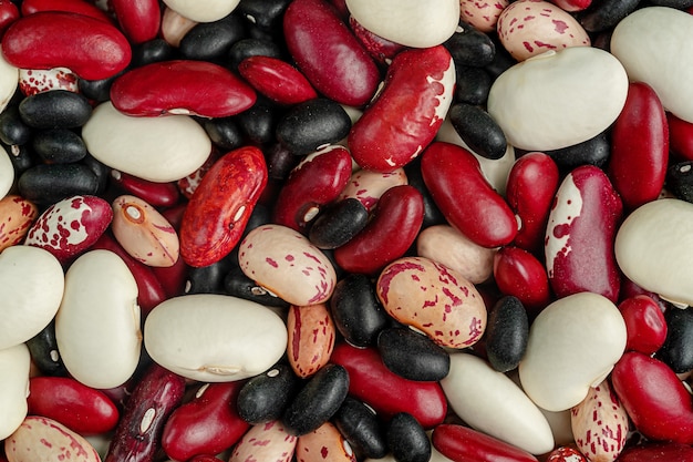 Mixed legumes beans background. Top view, overhead