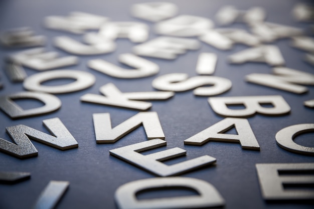 Mixed letters pile closeup photo