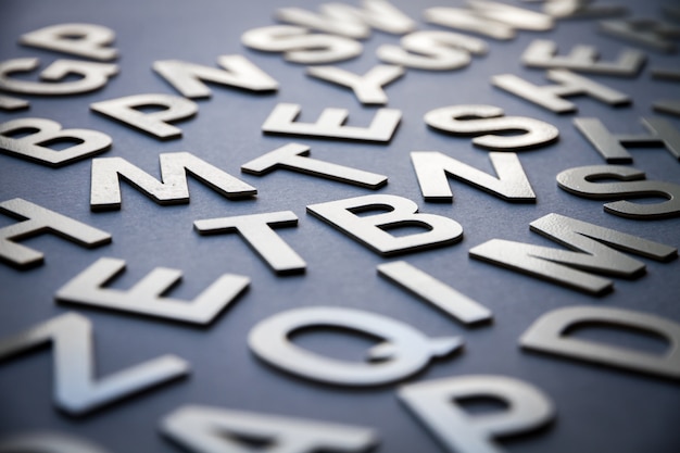 Mixed letters pile closeup photo