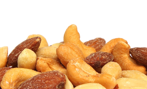 Mixed nuts over white background