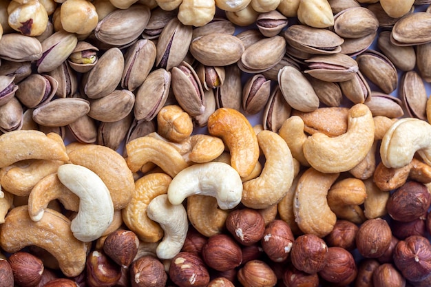 Photo mixed nuts on a white background