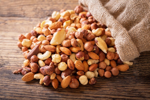 Mixed nuts on a wooden table