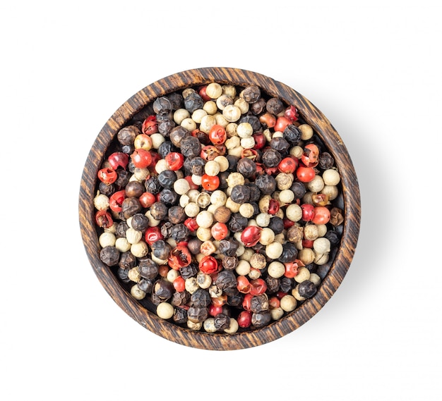 Mixed of peppers in wood bowl isolated