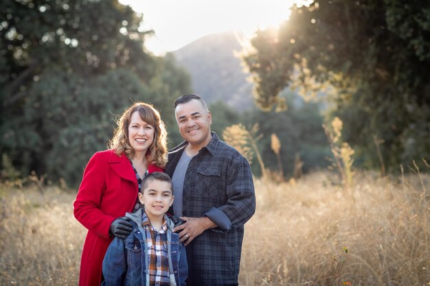 Mixed Race Family Portrait Outdoors