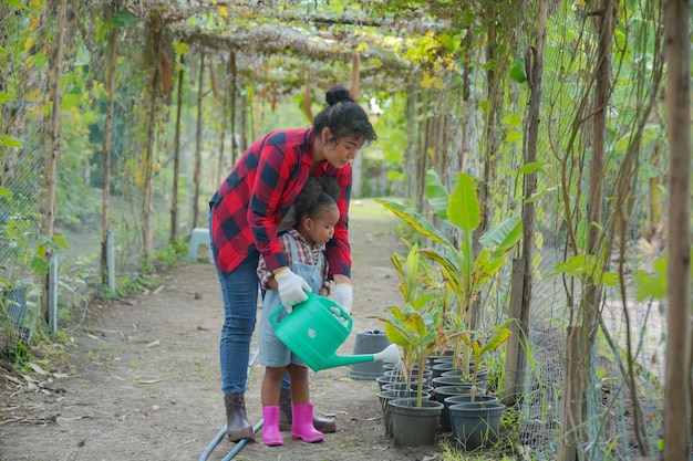 Mixed race family with daughter spending time together at organic's farm AfricanAmerican family