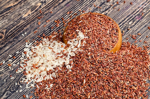 Mixed rice of several types before cooking, mixed steamed rice and unpeeled red brown rice