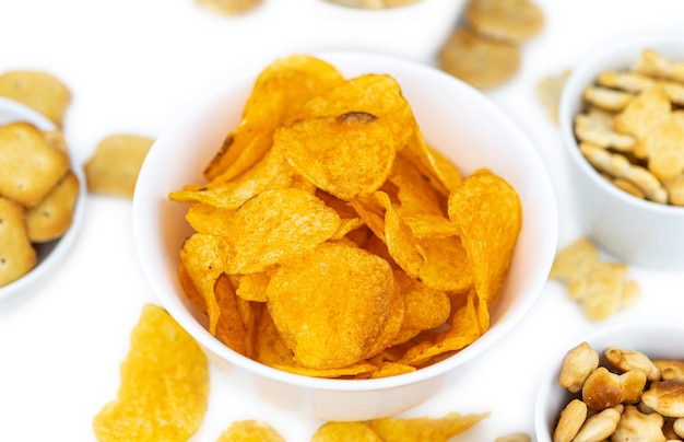 Mixed Snacks isolated on white close up shot selective focus