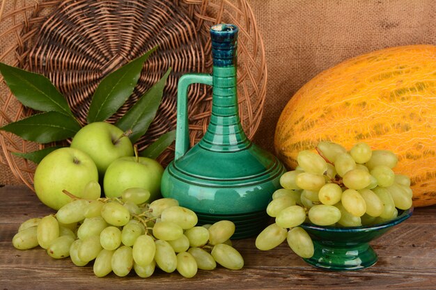 Mixed summer fruits on wooden table