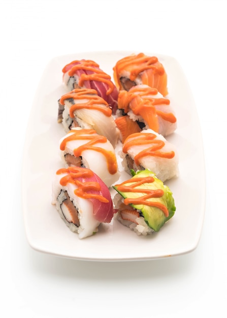 mixed sushi roll with spicy sauce - japanese food style