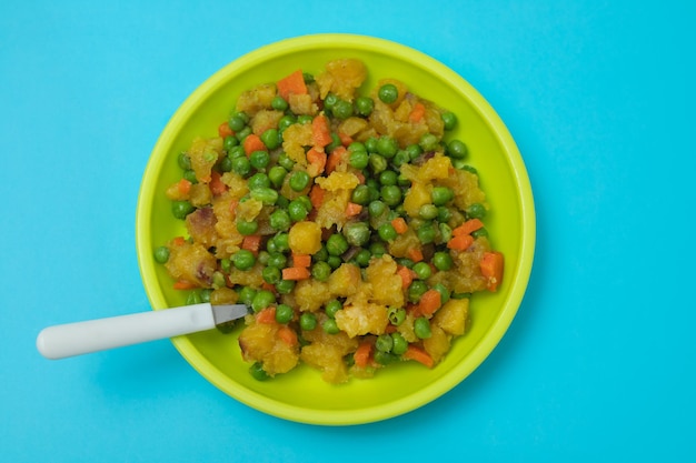 Mixed vegetables peas carrot potato child plate