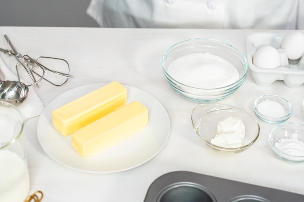 Mixing batter to bake home made vanilla cupcakes.