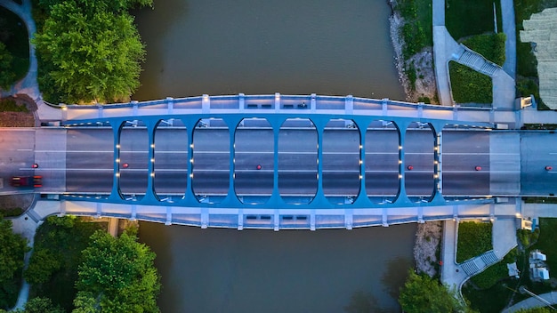 MLK bridge downward view aerial at dusk with lights and car