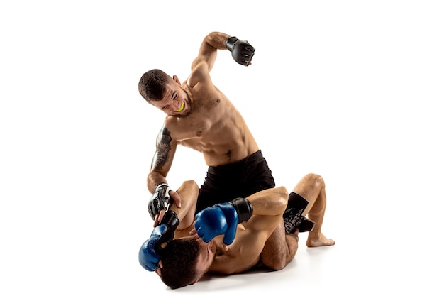 MMA Two professional fightesr punching or boxing isolated on white studio background