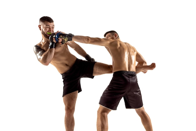 MMA Two professional fightesr punching or boxing isolated on white studio background