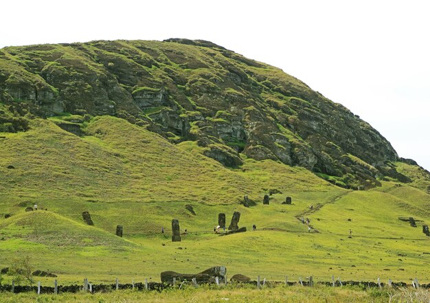 Moai statues abandoned on Rano Raraku volcano on Easter Island of Chile