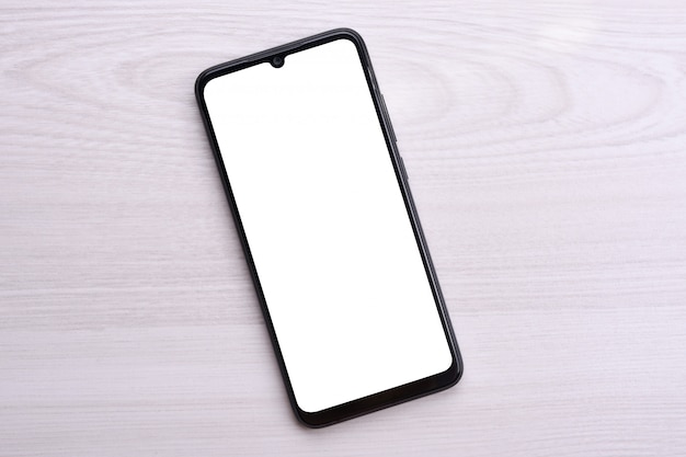 Mobiele telefoon smartphone met wit scherm voor uw tekst