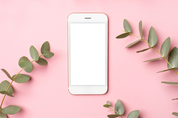 사진 핑크에 휴대 전화와 녹색 식물 유칼립투스