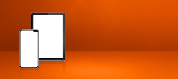 Mobile phone and digital tablet pc on orange office desk. Horizontal background banner. 3D Illustration