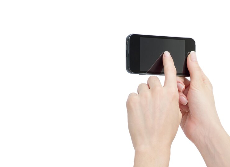 Photo 女性の手で携帯電話