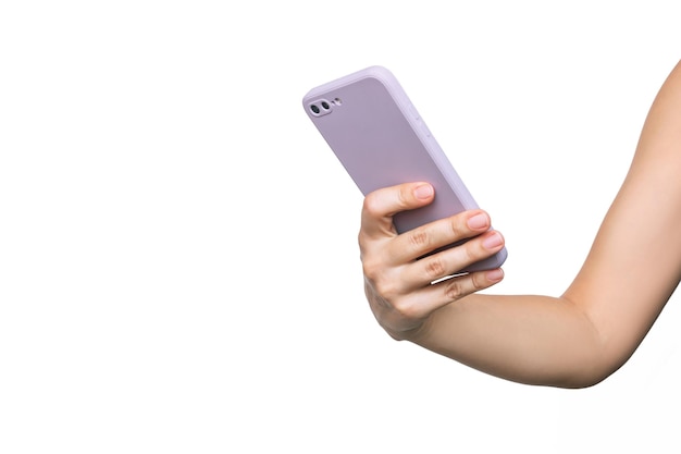 Mobile phone in purple case in female hand isolated on a white background