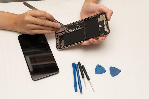 Mobile phone or smartphone repair technician