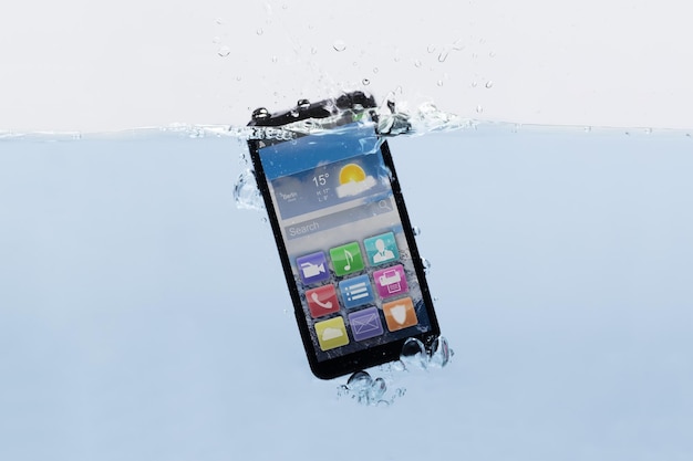 mobile phone submerged in water