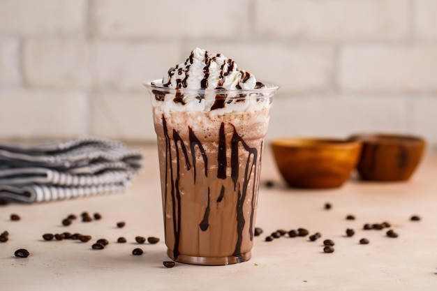 mocha creamy delight with ice cream and chocolate chip and coffee beans served in glass isolated on table top cafe dessert frappuccino blended drink
