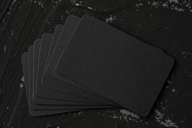 Photo mock-up or blank business card on black background