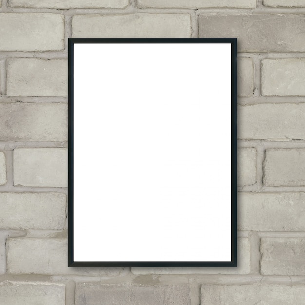 Mock up blank poster picture frame on brick wall