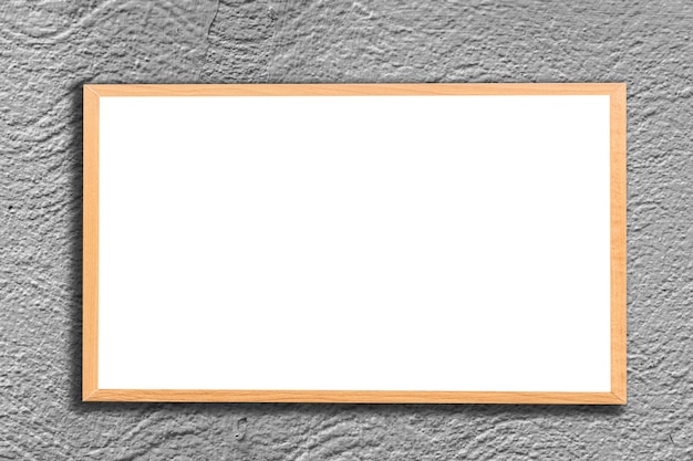 Mock up blank wooden picture frame on brick wall