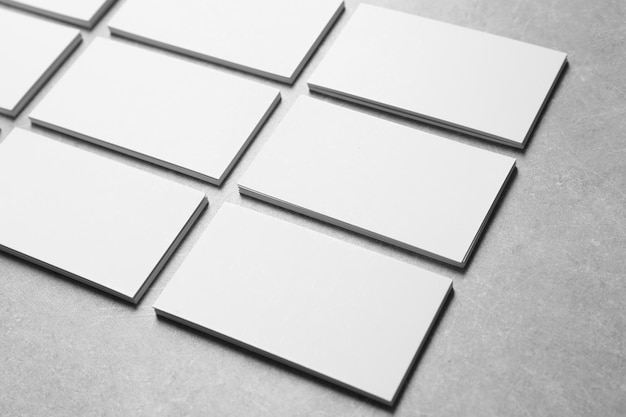mock up of business cards on grey background