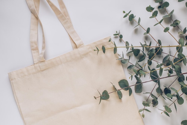 Mock up eco cotton bag with eucalyptus sprigs