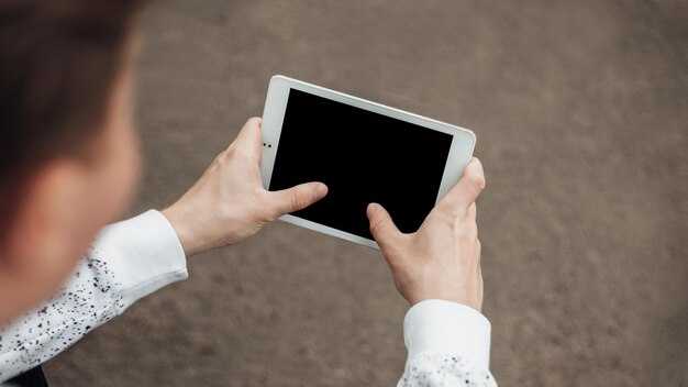 Mock up image of man hold tablet pc