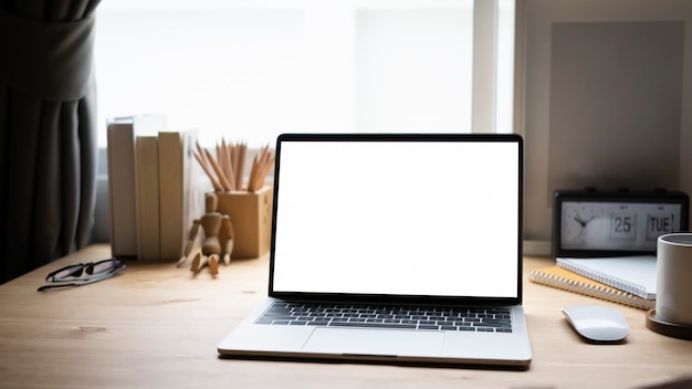 Mock up laptop and equipment on wooden table