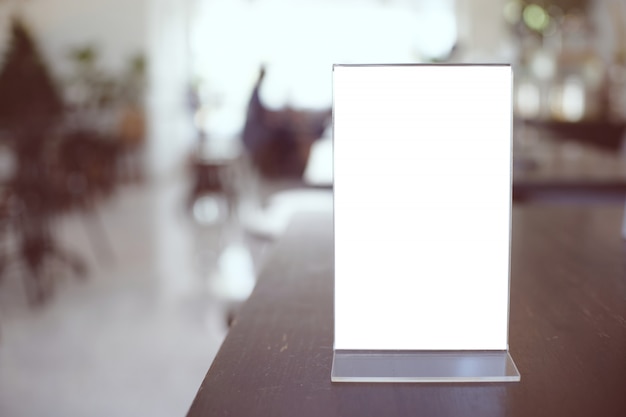 Mock up Menu frame standing on wood table