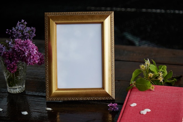 Mock up picture frame with lilac flowers modern interior copy\
space trendy template