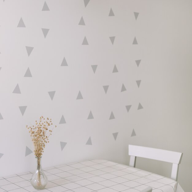 mock up wall in modern kitchen interior with a table and chair