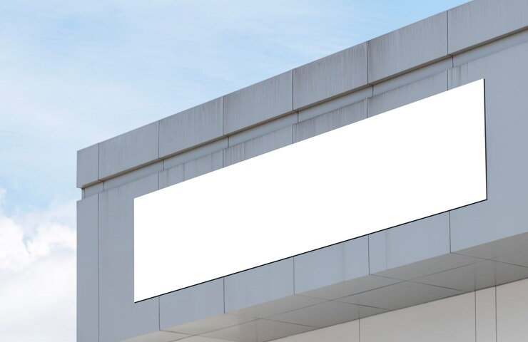建物の白い背景の看板をモックアップします。モックアップ用のクリッピング パス